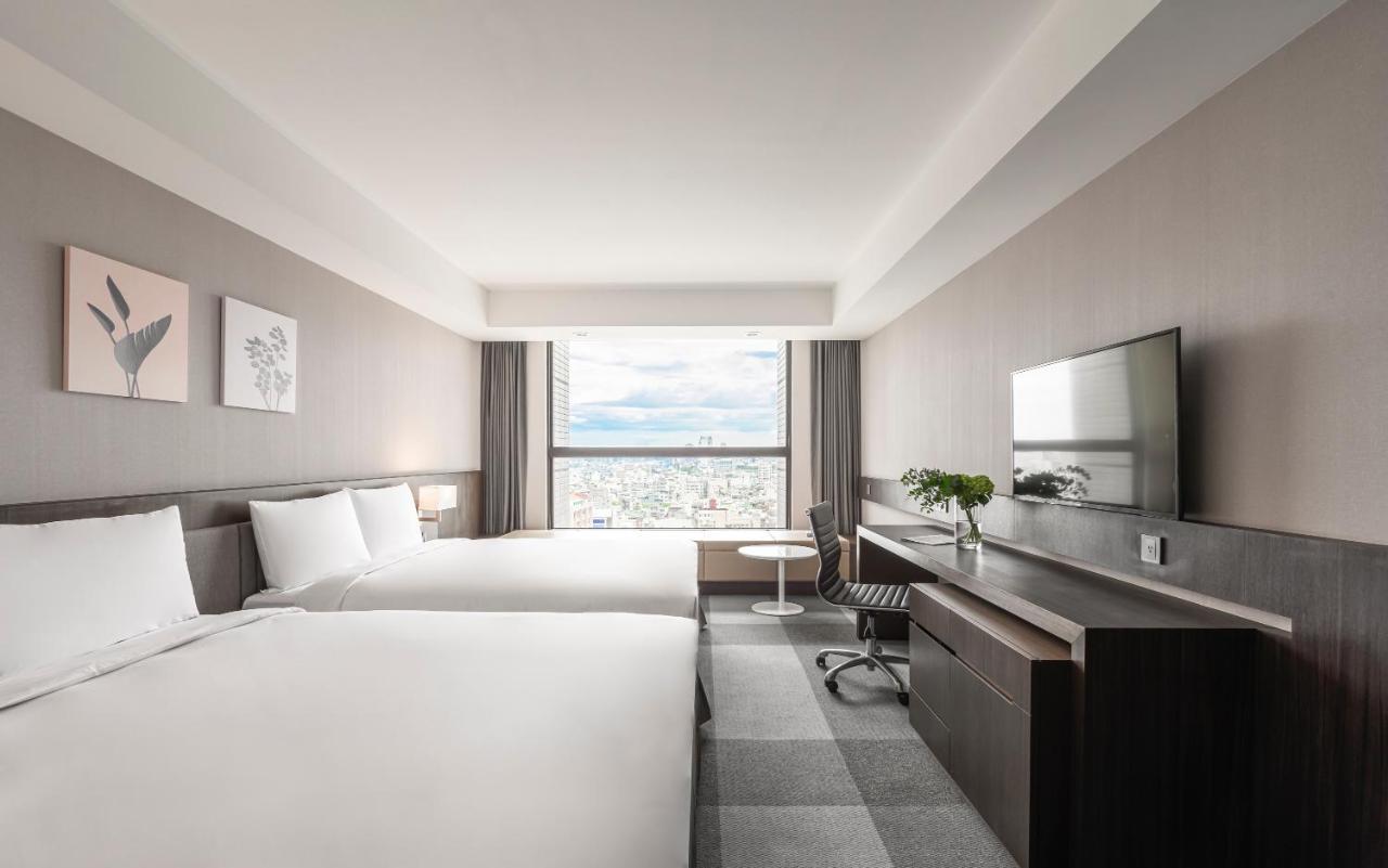 Lakeshore Hotel Тайнан Стая снимка